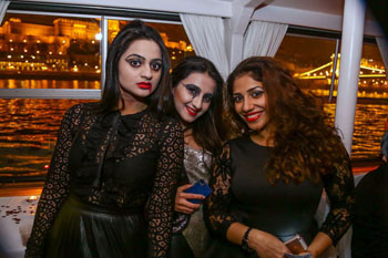 3 girls dressed in black on the party boat