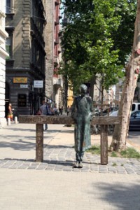 The Statue of Miklós Radnóti poet in front of the theatre named after him