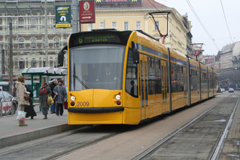 the yellow Combino Tram on Grand Boulevard 