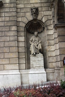 stone statue of Erkel sitting don