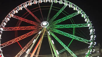 the ferris wheel illuminated in the national tricolor