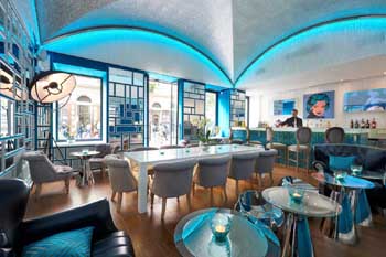 the lively blue decor of the bar
