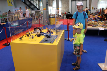 our 4-year old and 11 year old sons viewing Lego toys on the xhibit in 2015