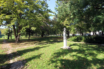 a park with a statue