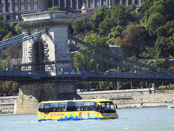 the yellow water bus at the Chain Bridge