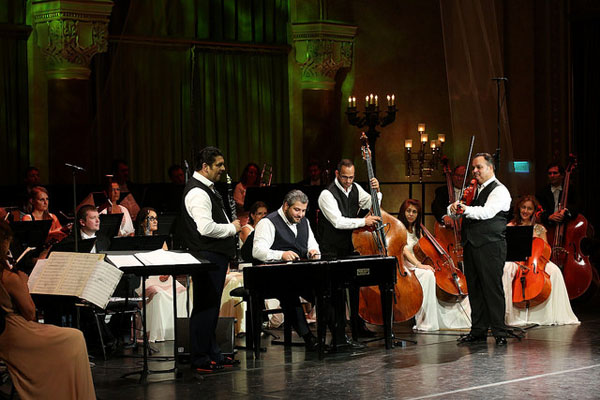 a gypsy orchestra playing on stage of the Vigado