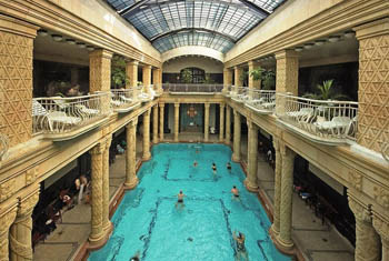 swimming pool and the clonnaded interior of the bath