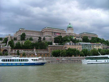 the Danube with the Royal Palace in the background on a cloudy day
