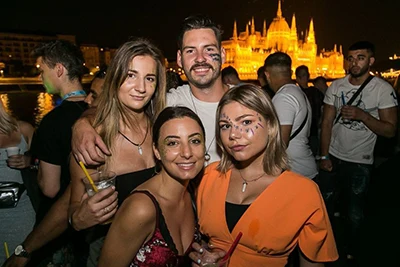 partying youngsters possibly on a boat on the Danube