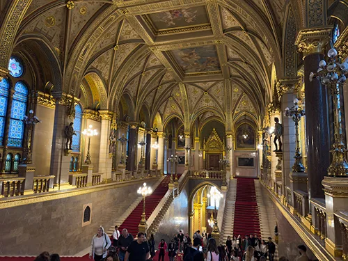 the red-carpeted grand staircase