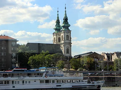 The twin towers of St. Anne Church in Buda on a slightly cloudy day