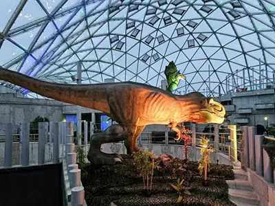 a life-size model of a dinsaur in the Biodome