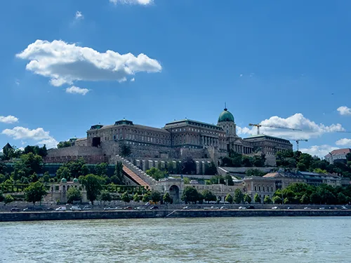 The Royal Palace and the National gallery building in Buda Castle from a cruise boat on a sunny day in May